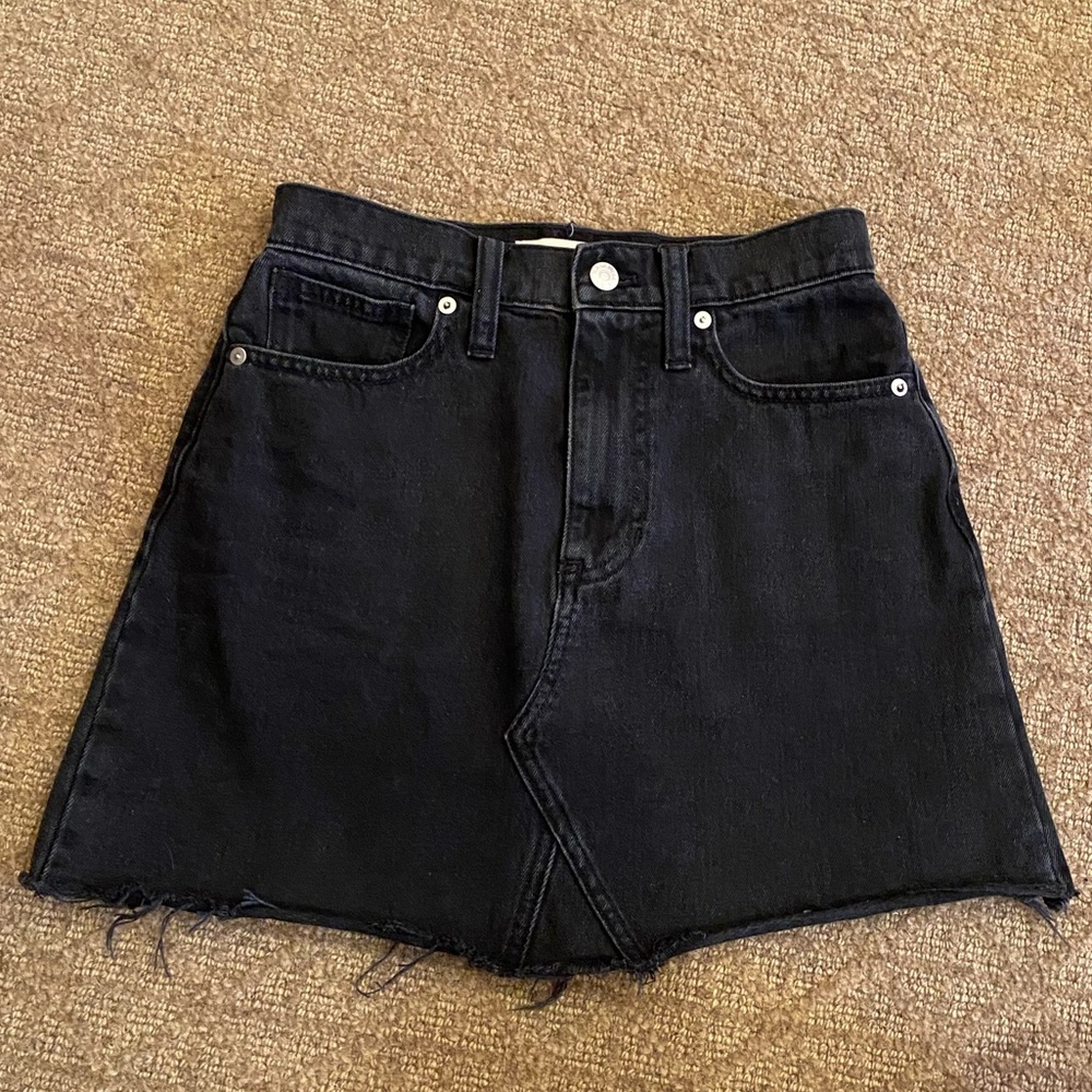 Black denim mini skirt